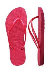 Havaianas flip-flops di un vivace rosa con suole testurizzate, cinturini flessibili e superficie antiscivolo. Taglia 37-38 indicata sulla soletta.
