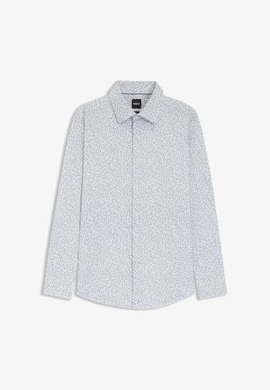 Camisa de manga larga abotonada en tela azul claro con pequeños patrones de hojas en azul marino; cuello clásico y dobladillo curvado. Etiqueta de la marca visible.