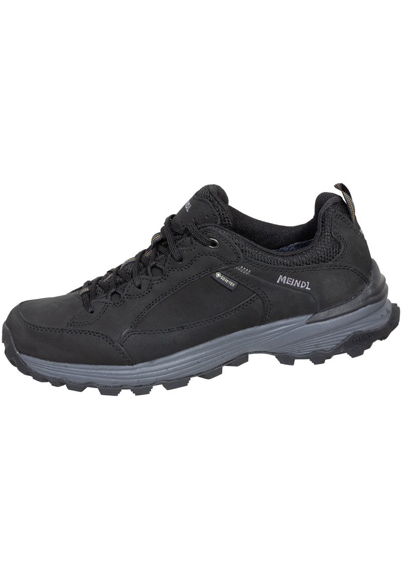 Black hiking shoe with suede and mesh upper, textured rubber sole, lace-up design, and durable Gore-Tex lining for water resistance.
