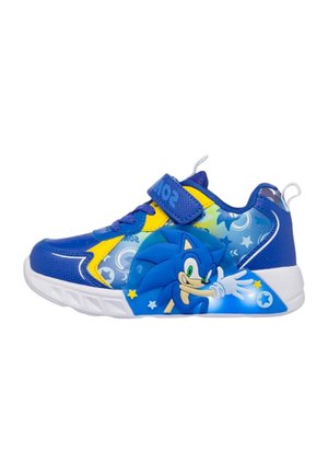 Zapatilla infantil azul y amarilla con gráfico de Sonic the Hedgehog, suela blanca, cordones y cierre de velcro.