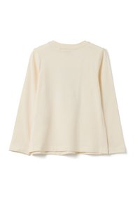 Crèmekleurige top met lange mouwen, gemaakt van zachte stof, met een ronde halslijn en een losse pasvorm met een rechte zoom.