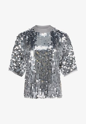 Srebrna bluzka na krótkie rękawy z okrągłym dekoltem. Posiada teksturowaną powierzchnię z lustrzanych dysków; luźny, wygodny krój dla komfortu.