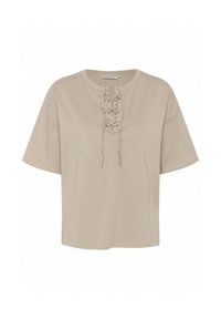 Beige kort mouw top gemaakt van zachte stof, met een vetersluiting aan de voorkant met metalen oogjes en een relaxed fit ontwerp.