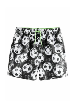 Pantaloni da bagno neri con un motivo ripetitivo di palloni da calcio bianchi su uno sfondo grigio macchiato, con un cordino verde neon.