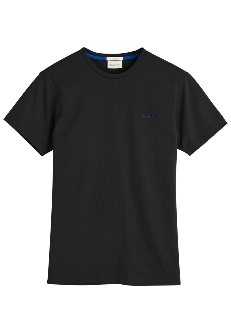 Camiseta de algodón negra con mangas cortas, cuello redondo y logo azul de 'GANT' en el pecho. Textura suave, corte clásico y sin patrones adicionales.