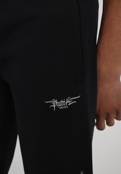 PHOBIA ARCHIVE PANTS WITH LATERAL WHITE LIGHTNING PRINT AND EMBROIDERY GOTIC LOGO - Donji dijelovi trenirke - black/white