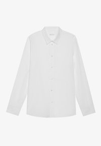 Camicia bianca a maniche lunghe realizzata in tessuto liscio. Presenta un colletto a punta e una patta con bottoni trasparenti. Design semplice e classico.
