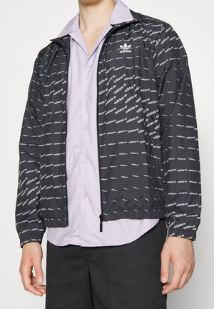 Veste de survêtement - black
