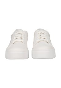 White canvas sneakers with a round toe, lace-up front, flat white sole, and subtle stitching details. Smooth texture and minimalist design.