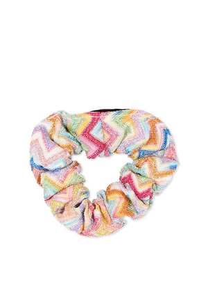 Gumka do włosów z wielokolorowym wzorem zygzaku w pastelowych odcieniach, w tym różowym, pomarańczowym, żółtym, niebieskim i zielonym, na fakturowanej tkaninie.