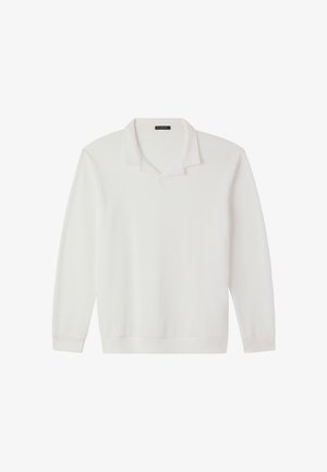 Polo shirt bianco a maniche lunghe realizzato in tessuto testurizzato con un design a costine. Presenta un colletto classico e una vestibilità rilassata.
