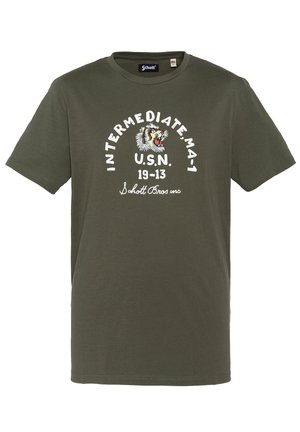 Olivengrøn T-shirt med hvid tekst "INTERMEDIATE MA-1 U.S.N. 19-13 Schott Bros inc" og en brølende tiger-grafik på brystet.