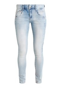 Ljust blå denim skinny jeans med en blekt tvätt, fem fickor, dragkedja och metallknappstängning. Slät textur, tapered ben design.