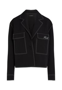 Zwarte cropped jack gemaakt van gladde stof, met witte stiksels, twee voorzakken en een knoopsluiting. Inclusief geborduurd logodetail.