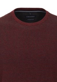 Red textured knit sweater with a round neckline, labeled "CASA MODA," featuring a cashmere-feel fabric and dark inner lining.