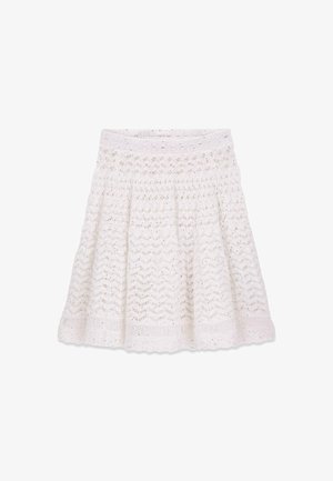 White lace knee-length skirt with a floral and zigzag pattern, elastic waistband, and scalloped hem.