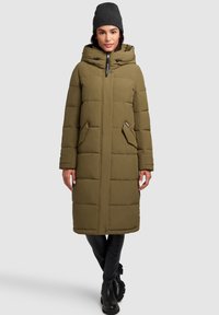 Padded olive green coat with a hood, featuring two side pockets, a front zipper, and a slightly shiny texture. Made of synthetic material.
