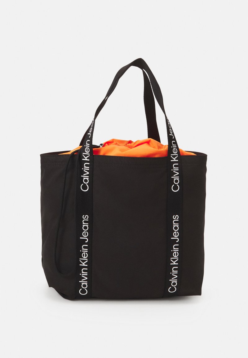Calvin Klein Jeans LOGO TAPE UNISEX Borsa a mano ck black/nero