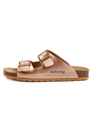 Sandale à glissière rose doré avec deux brides réglables, dessus en simili cuir, semelle intermédiaire en liège et semelle extérieure en caoutchouc texturé. Logo "billowy" sur le côté.