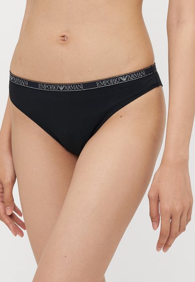 Black cotton bikini with a low-rise design and an elastic waistband featuring the "Emporio Armani" logo in silver lettering.