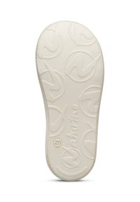Semelle de chaussure en caoutchouc blanc présentant un motif texturé de logos circulaires et du nom de la marque "Naturino", avec la taille "20" marquée près du bord.