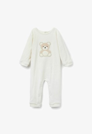 Bílý fleecový overal s dlouhými rukávy, s béžovou nášivkou medvídka na přední straně a patentky ve spodní části pro snadné oblékání.