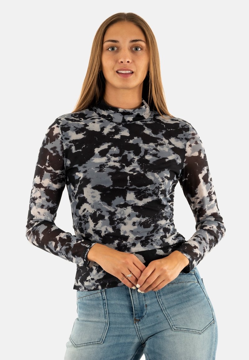Top a maniche lunghe con collo alto in un motivo astratto di nero, grigio e bianco, caratterizzato da un design aderente e un tessuto morbido e elasticizzato.