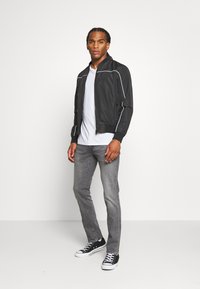 Levi's® 511™ SLIM - Calças de ganga justas - richmond power