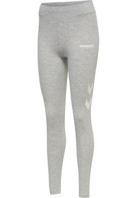 Grå leggings gjorda av mjukt tyg, med en bred midja och en vit logotyp med två zigzag-mönster på underbenet.