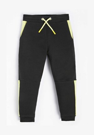 AKTIV SEITLICHES LOGO - Trainingsbroek - schwarz