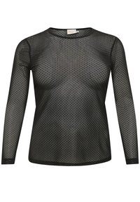 Black long-sleeve top made of sheer fabric with a polka dot pattern. Features a round neckline and fitted silhouette.
