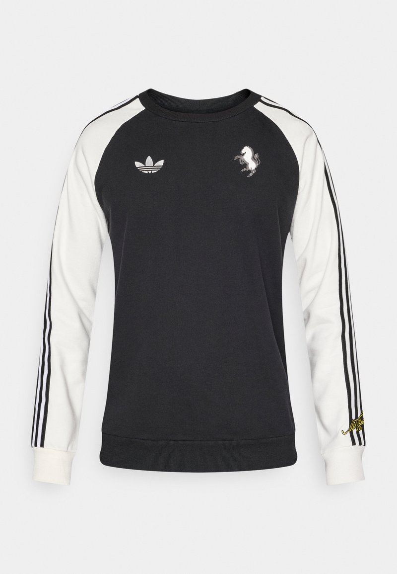 Schwarzer Sweatshirt mit weißen Raglanärmeln, ausgestattet mit drei schwarzen Streifen, bestickten Logos und einer weichen Textur. Klassisches Rundhalsdesign.