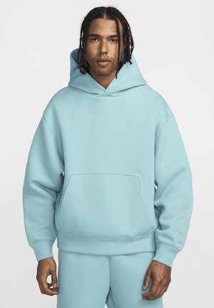 Light blue hooded sweatshirt in soft material, featuring a front pocket and ribbed cuffs. Smooth texture with minimal branding detail.