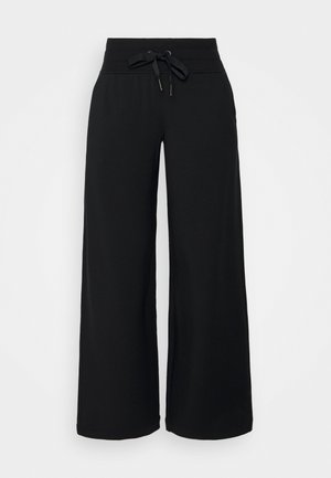 BALANCE PANT - Verryttelyhousut - black