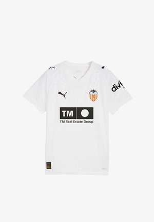 Balta trumpa futbolo marškinėliai su įtrūkusių raštų dizainu, juodos spalvos logotipais ir Valencia CF emblema ant krūtinės. Pagaminta iš dryCELL medžiagos.