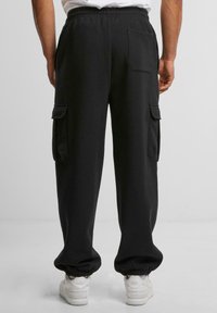 Urban Classics Cargo trousers - black