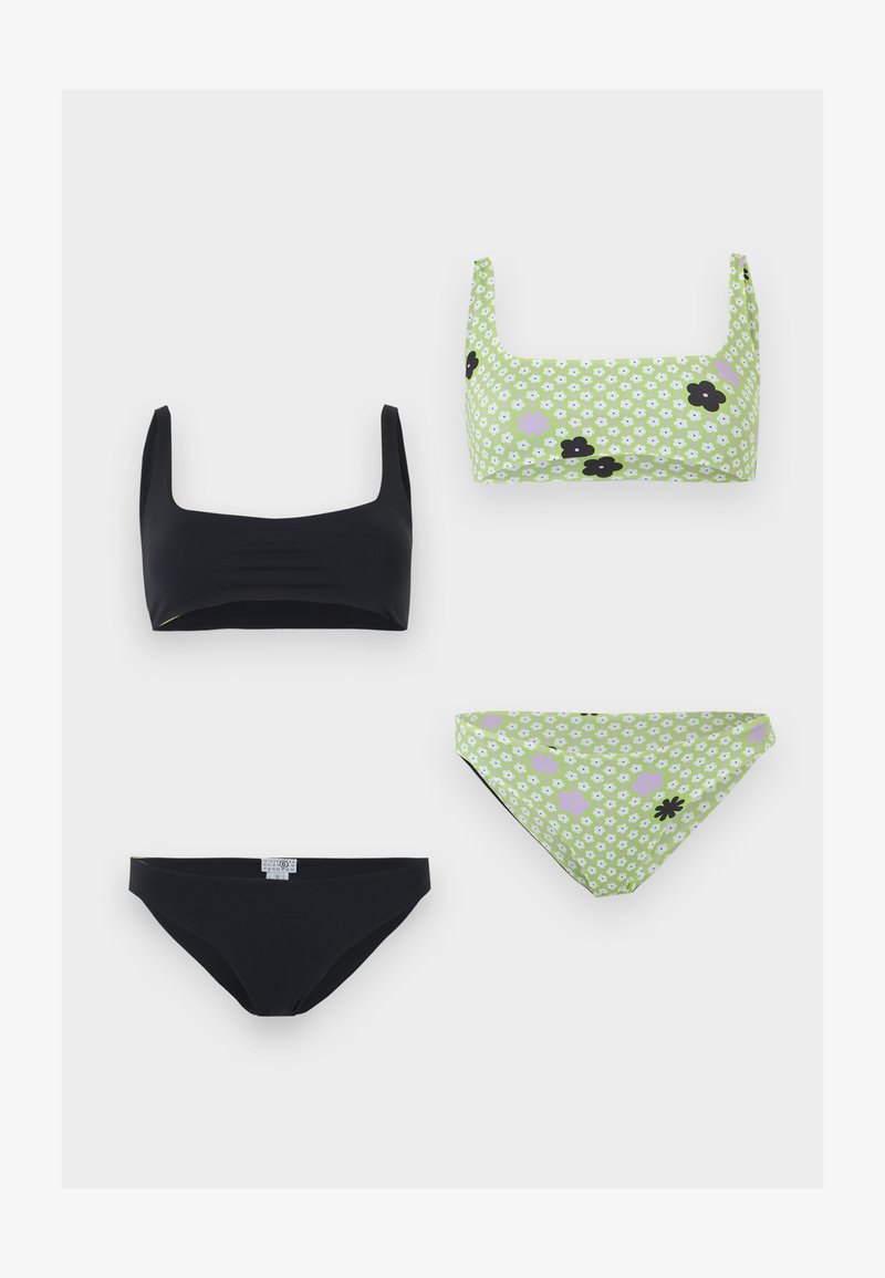 Twee tweedelige bikini's, één effen zwart en de andere lichtgroen met een wit-zwart bloemenpatroon, weergegeven op een witte achtergrond.