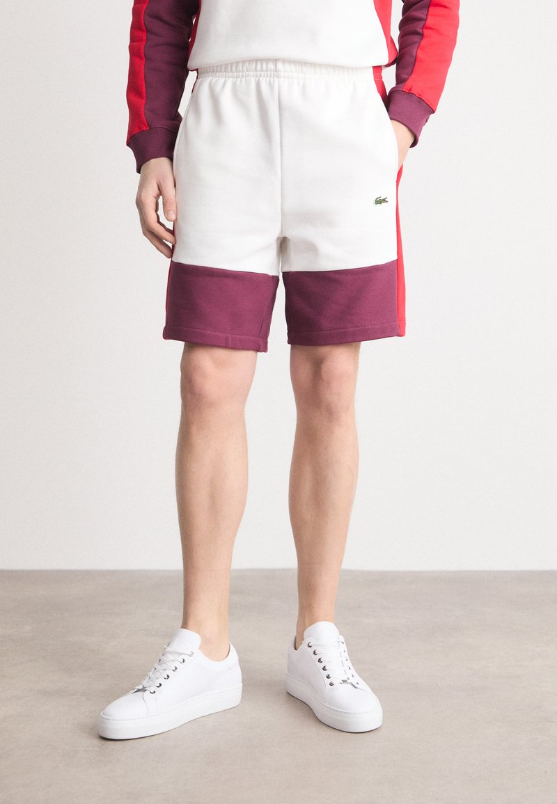 Lacoste ELEVATED COLORBLOCK  - Verryttelyhousut - flour/red-spleen