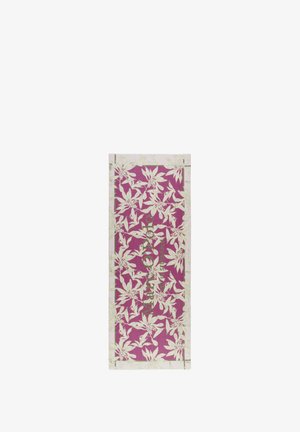 Rectangular product packaging in vibrant pink with white floral pattern. Green text features prominently in the center. Matte finish, minimal accents.
