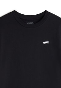Černé bavlněné tričko s kulatým výstřihem a malou bílou grafikou skateboardu na levé části hrudi. Měkká textura, minimalistický design.