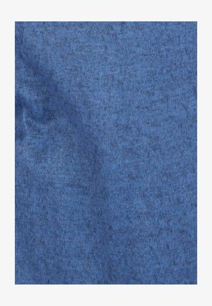 Zachte, gebreide stof in een textuuropmaak met een effen middelblauwe kleur. Heeft een licht oneven oppervlakte voor extra diepte.