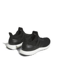 Pair of black Adidas Ultra Boost running shoes with white cushioned soles, viewed from the back on a white background.