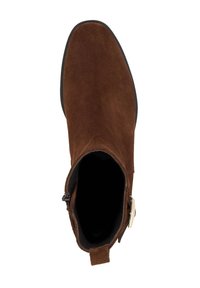 Brown suede ankle boot featuring a sleek design, pointed toe, side zipper, and metallic buckle accent on the outer side.