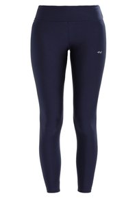 Marinblå leggings i elastisk, slät tyg. Hög midja, kroppsnära siluett och en liten logodetalj nära midjan.