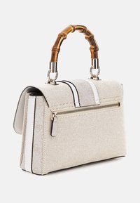 Beige handbag with bamboo handle, textured fabric, and silver hardware. Features a zippered pocket and contrasting white accents.