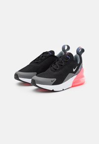 Black mesh athletic shoes with gray accents and white soles. Features a pink air unit, lace-up design, and branding on the tongue.
