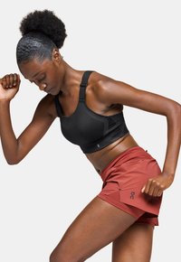 On PERFORMANCE FLEX  - Medium support sports bra - black