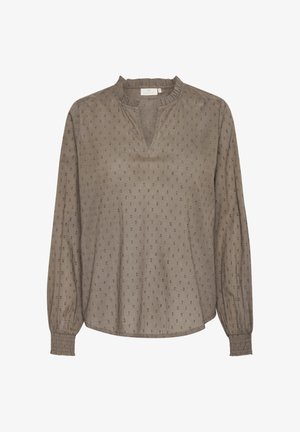 Blouse marron à manches longues avec un col à volants, un décolleté en V et un motif en points texturé. Poignets ajustés avec bande élastique. Tissu doux.