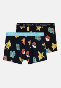 Un ensemble de boxers en coton présentant deux motifs : l'un bleu marine avec des personnages de Pokémon et l'autre noir avec des Poké Balls, tous deux avec des ceintures contrastées.