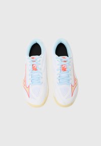 White athletic shoes featuring a breathable mesh upper with light blue accents, pink detailing, and a textured rubber sole.